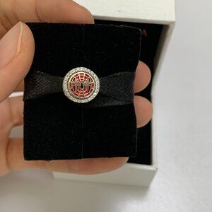 Pandora the land’s logo and Spider-Man W.E.B.Charm Adventure Collection Pendant